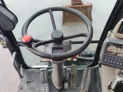 Колесный экскаватор Hitachi ZX140W -3