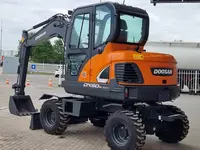 Колесный экскаватор Doosan DX60W - 688 535 564 сум