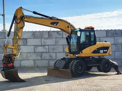 Колесный экскаватор Caterpillar M313 D