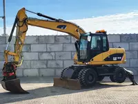 Колесный экскаватор Caterpillar M313 D