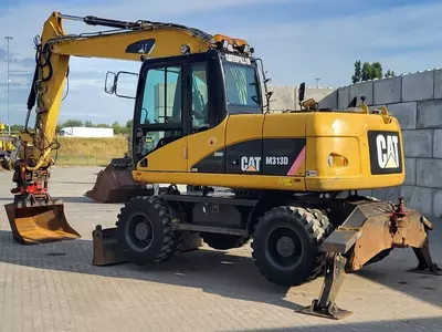 Колесный экскаватор Caterpillar M313 D