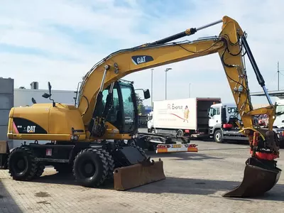 Колесный экскаватор Caterpillar M313 D