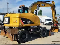 Колесный экскаватор Caterpillar M313 D Только в розницу