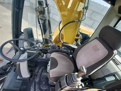 Колесный экскаватор Caterpillar M313 D