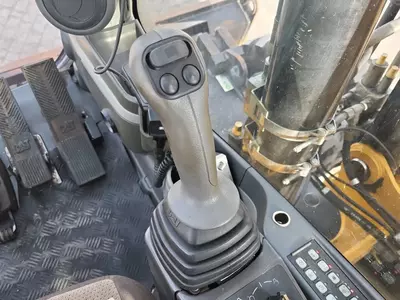 Колесный экскаватор Caterpillar M313 D