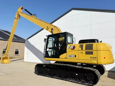 Экскаватор с длинной стрелой Caterpillar 323D3