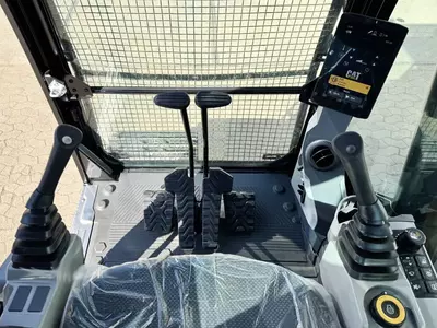 Экскаватор с длинной стрелой Caterpillar 323D3