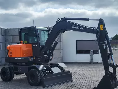 Колесный экскаватор Develon DX60 WN ECO-1
