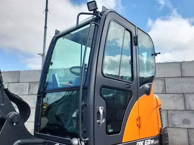 Колесный экскаватор Develon DX60 WN ECO-1