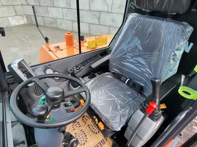 Колесный экскаватор Develon DX60 WN ECO-1