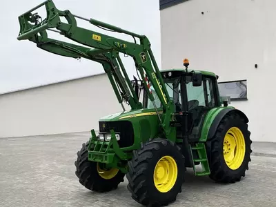 Колесный трактор John Deere 6420
