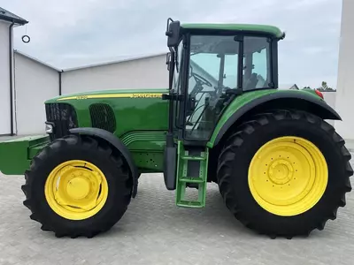Колесный трактор John Deere 6620