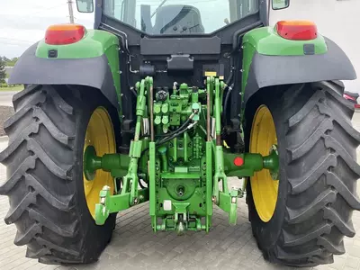 Колесный трактор John Deere 6620