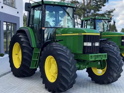 Колесный трактор John Deere 6900