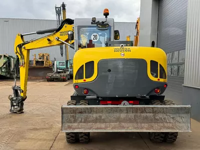 Колесный экскаватор Wacker Neuson EW100 E06-03