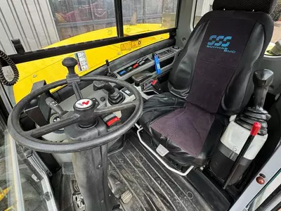 Колесный экскаватор Wacker Neuson EW100 E06-03