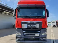 918 015 690 сум Грузовик с крюковым погрузчиком MAN TGX 26.470 6X2 VDL