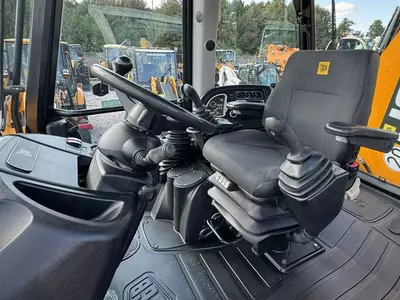 JCB 3CX ekskavator yuklagichi
