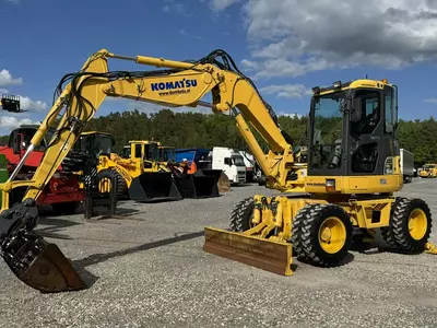 Колёсный экскаватор Komatsu PW 98 MR 8 Pług + Podpory 10ton Szybkozłącze