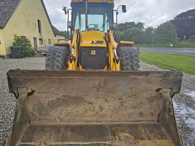   Экскаватор-погрузчик JCB 4CX