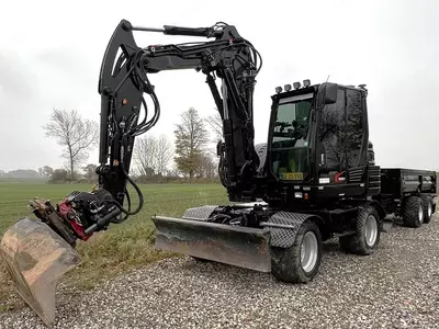 Колёсный экскаватор Takeuchi TB295 W