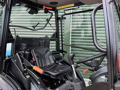 Колесный трактор Tafe 6028M CAB