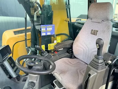 Колесные экскаватор Caterpillar M318F