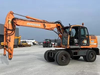 Колесный экскаватор Doosan DX140W