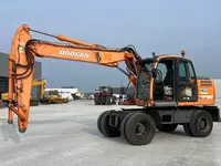 Колесный экскаватор Doosan DX140W