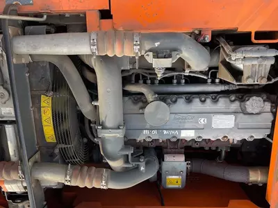 Колесный экскаватор Doosan DX140W