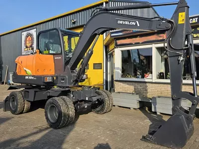   Колесные экскаватор Develon DX60WN ECO-1