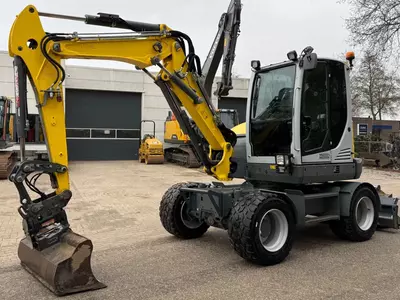 Колесные экскаватор WACKER NEUSON EW65