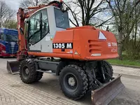  Atlas 1305M g‘ildirakli ekskavatori - 