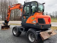  Doosan DX55WK g‘ildirakli ekskavatori - 