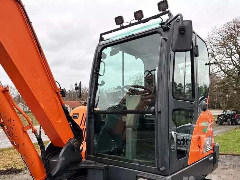 Колесный экскаватор Doosan DX55WK