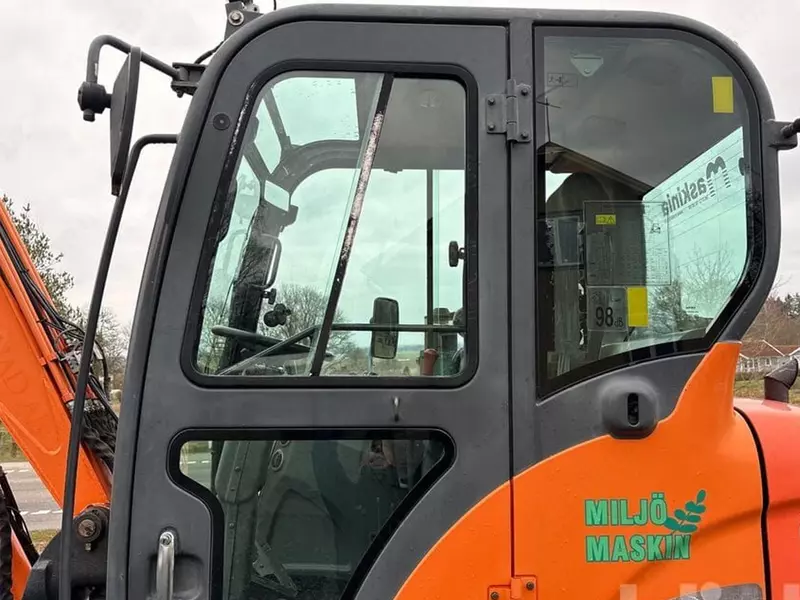 Колесный экскаватор Doosan DX55WK