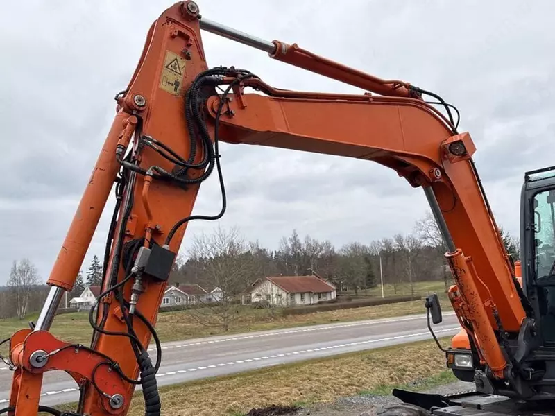 Колесный экскаватор Doosan DX55WK