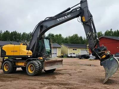 Колесный экскаватор Volvo EW 180 C
