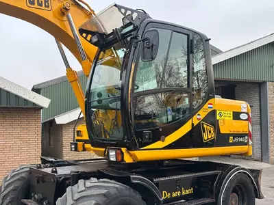 Колесный экскаватор JCB JS 145 W
