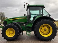  Колесный трактор John Deere 7720 - 