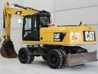  Caterpillar M322D g‘ildirakli ekskavatori - 