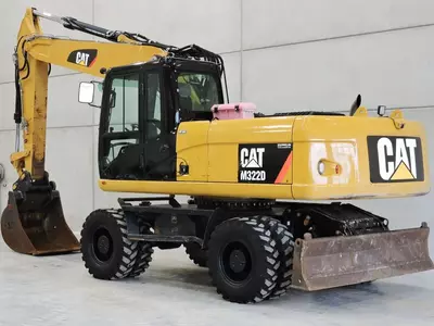 Колесный экскаватор Caterpillar M322D