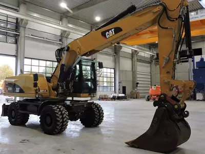 Колесный экскаватор Caterpillar M322D