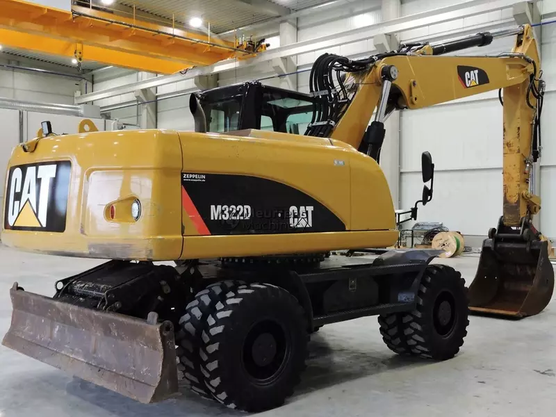 Колесный экскаватор Caterpillar M322D