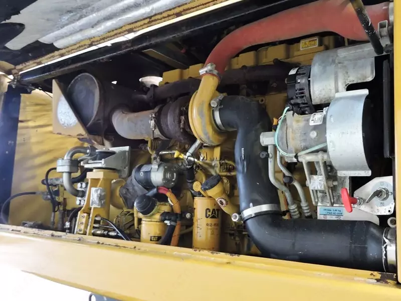 Колесный экскаватор Caterpillar M322D
