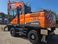  Колесный экскаватор Doosan DX210W-5 с сортировочным грейфером Zijtveld S1202D - 