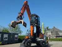  Колесный экскаватор Doosan DX210W-5 с сортировочным грейфером Zijtveld S1202D Только в розницу