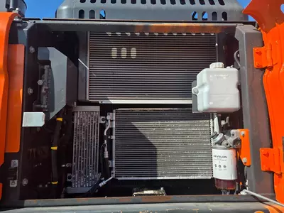 Колесный экскаватор Doosan DX210W-5 с сортировочным грейфером Zijtveld S1202D