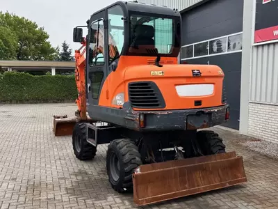  Колесный экскаватор Doosan DX55WK с кондиционером. - 