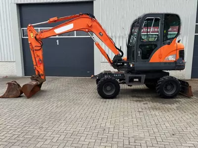 Колесный экскаватор Doosan DX55WK с кондиционером. Только в розницу